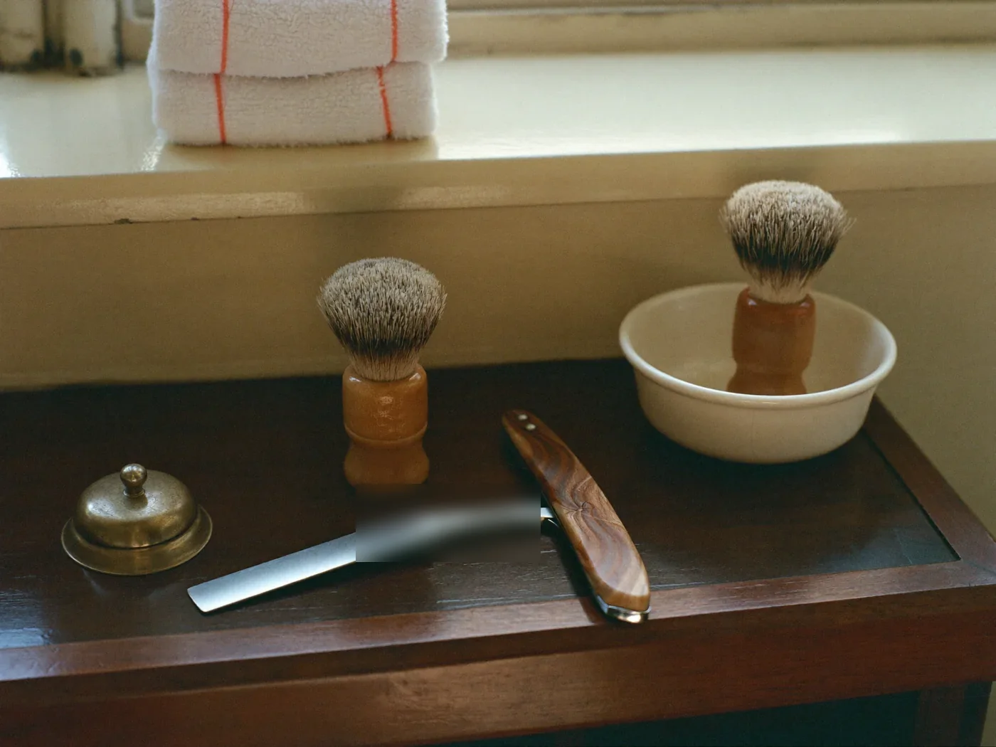 Razor, brush and brass